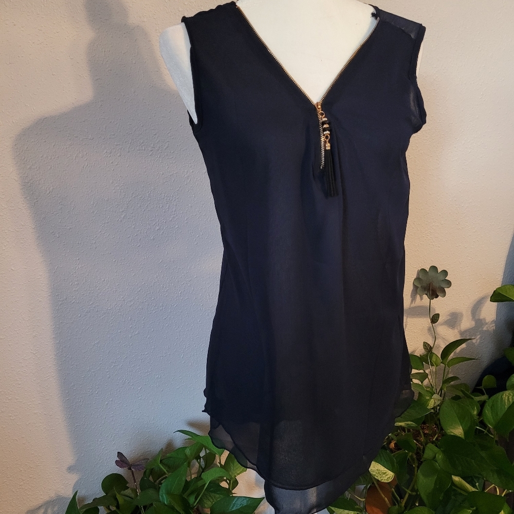 Womens dark blue  zips half in front  and criss ba